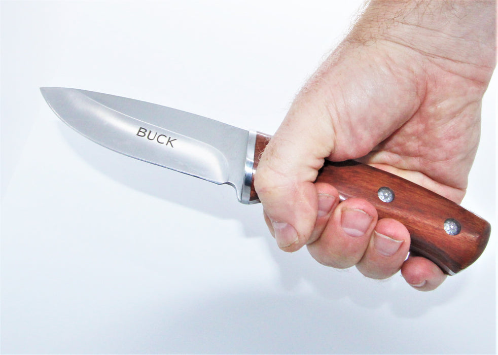 Buck tur- og fiskekniv med 10 cm knivblad og trehåndtak